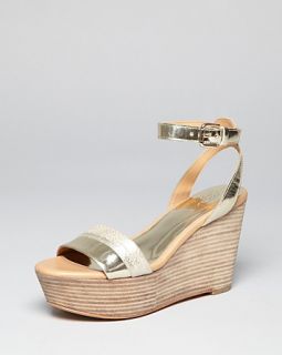 coach caitlyn wedge price $ 178 00 color platinum size select size 6 5