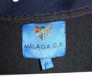 Malaga polo shirt by Ernest & John Embroidered logo Zip top, pullover