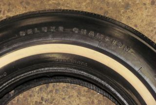 You are bidding on a very good used Firestone Deluxe Champion F78 15