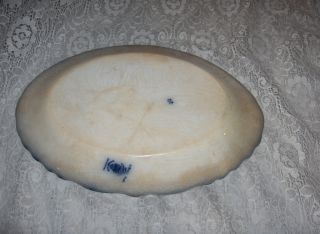 Up for sale is a very pretty antique flow blue oval serving tray (12